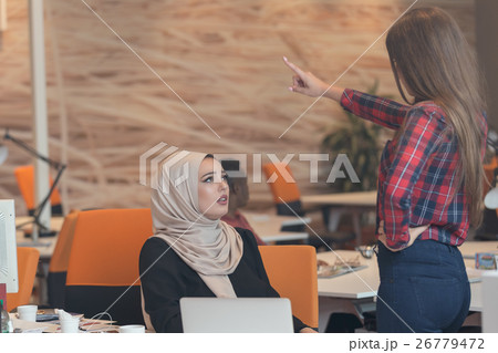 arabic businesswoman wearing hijab receiving 26779472