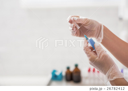 General practitioner with plasma in hypodermic 26782412