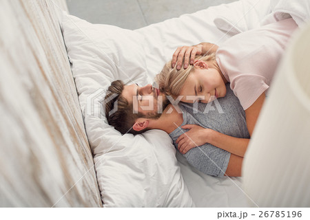 Pretty loving couple sleeping together 26785196
