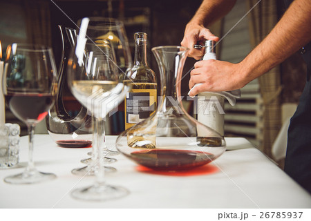 Variety of alcohol at table 26785937