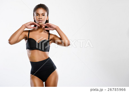 Young woman posing with sexuality 26785966