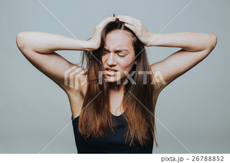 Young pretty female in despair 26788852