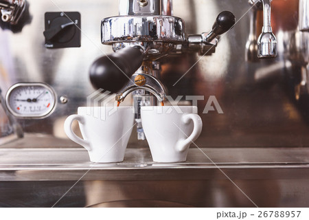 front view of the coffee machine working 26788957