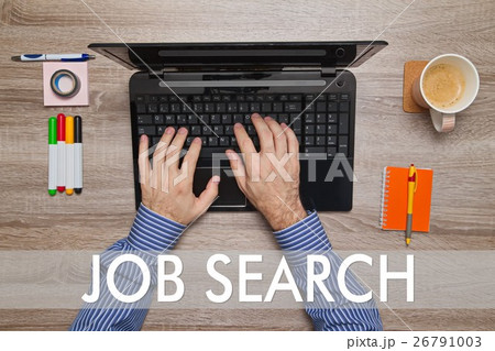 Male hand typing on laptop, text JOB SEARCH Male hand typing on laptop, text JOB SEARCH 26791003