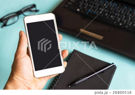 Hand holding blank screen mobile smart phone Hand holding blank screen mobile smart phone 26800516