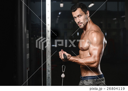 man with weight training in gym equipment sport man with weight training in gym equipment sport 26804119