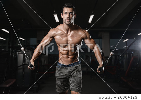 man with weight training in gym equipment sport man with weight training in gym equipment sport 26804129