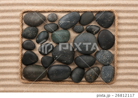 Frame made of rope with black stones Frame made of rope with black stones 26812117