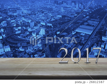 Happy new year 2017 silver metal text on table Happy new year 2017 silver metal text on table 26812387
