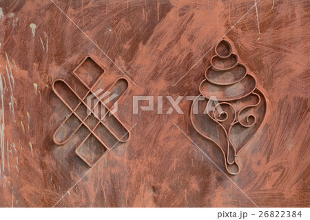 Dharma Wheel Buddhist symbol in old door 26822384
