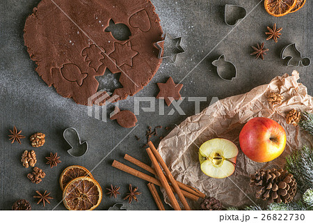 cutting gingerbread cookie with christmas decorati cutting gingerbread cookie with christmas decorati 26822730