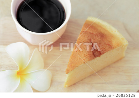 Pieces of Japanese style Cheesecake and coffee. 26825128