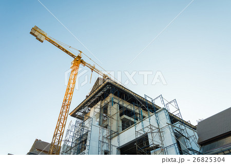 Construction crane and buildings. Construction crane and buildings. 26825304