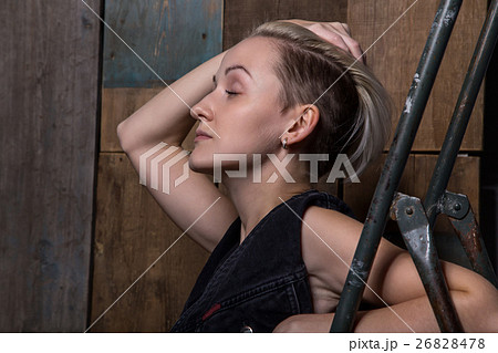 Blond woman with hand up Blond woman with hand up 26828478