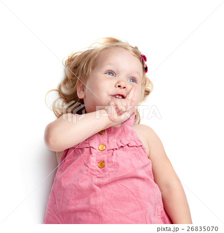 Young little girl lying over isolated white Young little girl lying over isolated white 26835070