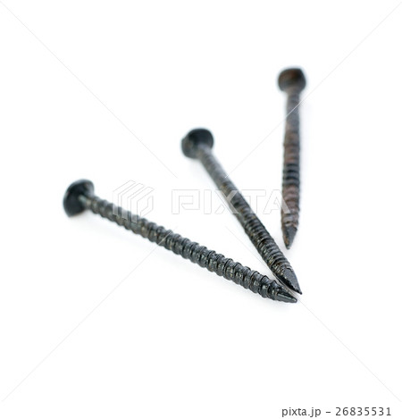 Pail of Metal nails isolated over the white Pail of Metal nails isolated over the white 26835531