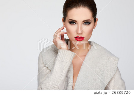 beautiful woman portrait in warm clothing beautiful woman portrait in warm clothing 26839720