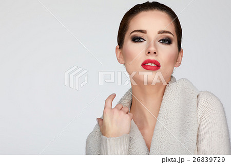 beautiful woman portrait in warm clothing beautiful woman portrait in warm clothing 26839729