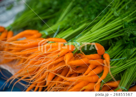 fresh baby carrots and leaf in market 26855567