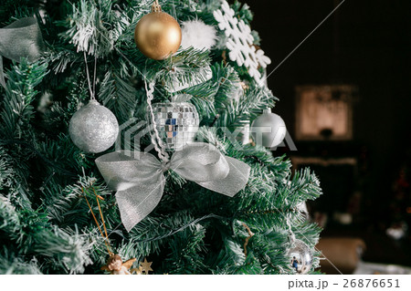 Close up of Christmas tree with ornaments baubles 26876651