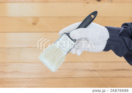 Hand in glove cotton holding brush paints 26876686