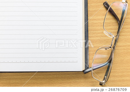 Notebook open blank page and Eyeglasses 26876709