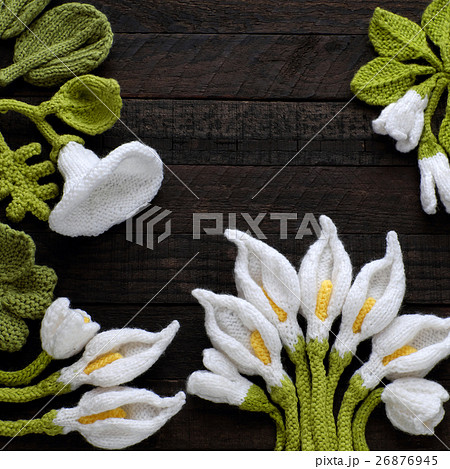 knitted green leaf and white flower background 26876945