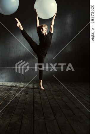 Concentrated young man dancing in the studio Concentrated young man dancing in the studio 26878620