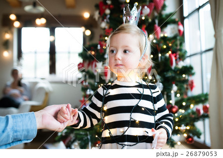 Father with daugter tangled up in light chain at 26879053