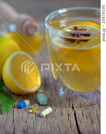 Hot lemon tea and pills 26879195