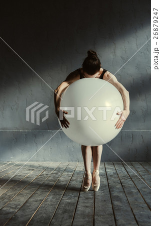 Expressive ballet dancer holding the big balloon 26879247