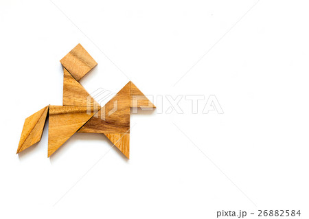 Wooden tangram as man riding horse shape Wooden tangram as man riding horse shape 26882584