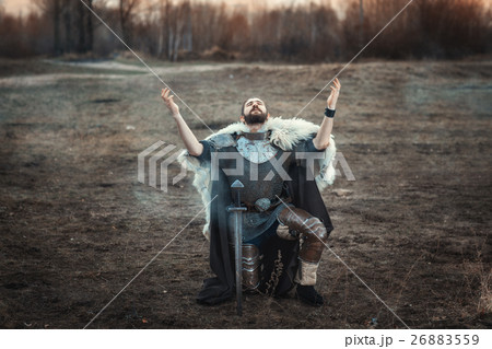 Warrior raised his hands to the sky. 26883559