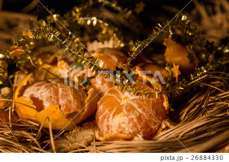 mandarins with christmas garlands 26884330