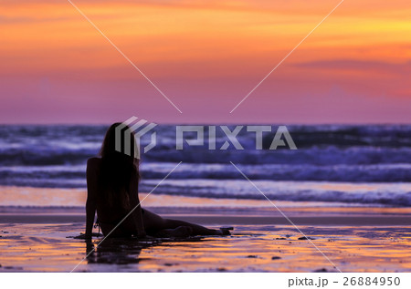 Silhouette young woman posing 26884950