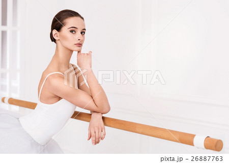 Confident pretty female looking at camera Confident pretty female looking at camera 26887763