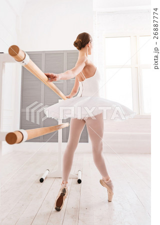 Image-side view of ballerina looking in the window Image-side view of ballerina looking in the window 26887774