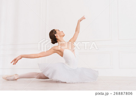 Pretty sporty woman holding her hands in the air 26887806