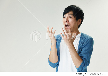 驚く男性の写真素材