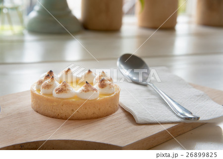 lemon tarts on wood plate lemon tarts on wood plate 26899825