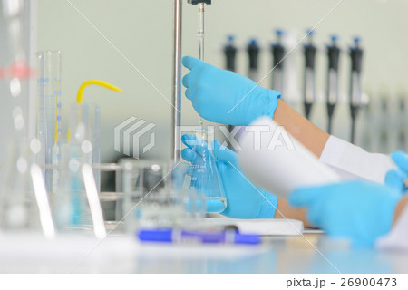 scientist is demonstrate the titration technique 26900473