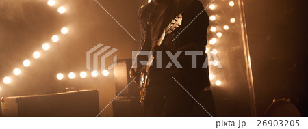 Electric guitar player on a stage, rock Electric guitar player on a stage, rock 26903205