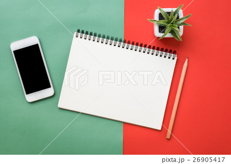 Top view of notebook on red green Christmas Top view of notebook on red green Christmas 26905417