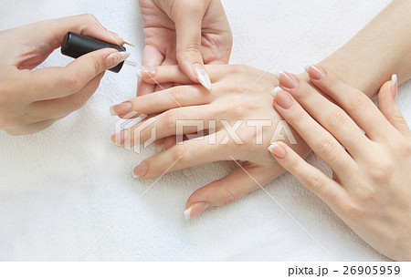 manicure making - female hands manicure making - female hands 26905959