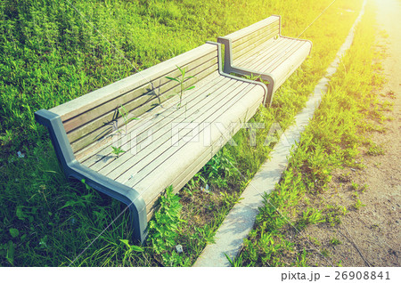 Wooden bench in park with vintage color. Wooden bench in park with vintage color. 26908841