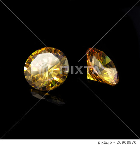 Yellow gems on a black background 26908970