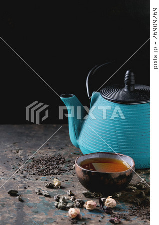 Variety of dry tea with teapot Variety of dry tea with teapot 26909269