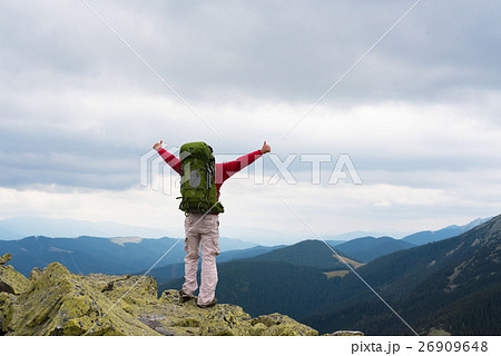 Hiker in mountains Hiker in mountains 26909648