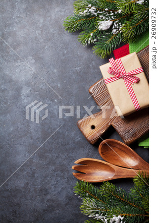 Christmas cooking table, gift box and utensils Christmas cooking table, gift box and utensils 26909732