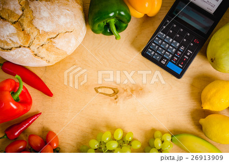 cash register and vegetables on the table cash register and vegetables on the table 26913909